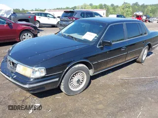 1992 Lincoln Continental with VIN 1LNLM9749NY670102, listed as a IAAI auction lot 41968015 with Not Provided miles and . Bid and sale history available at DreamBid. Image 2.