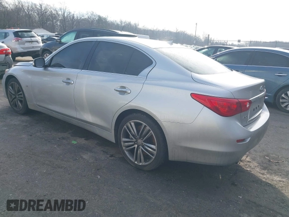 2015 Infiniti Q50 Premium z VIN JN1BV7AR8FM417712, wystawiony jako IAAI lot #41427839 z przebiegiem 88 424 mil mil oraz . Historia ofert i sprzedaży dostępna na DreamBid. Obrazek 3.