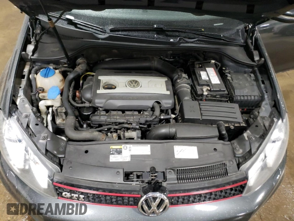 2013 Volkswagen GTI с VIN WVWGD7AJXDW129840, выставлен на аукционе Copart как лот 52946845 с пробегом 118 520 миль миль и Списание • Salvage title. История ставок и продаж доступна на DreamBid. Изображение 11.