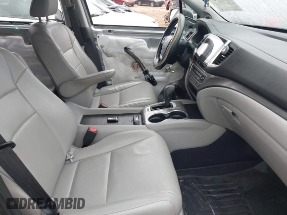 2018 Honda Pilot EX-L with VIN 5FNYF5H50JB022680, listed as a IAAI auction lot 41919787 with 159,205 mi miles and . Bid and sale history available at DreamBid. Image 5.