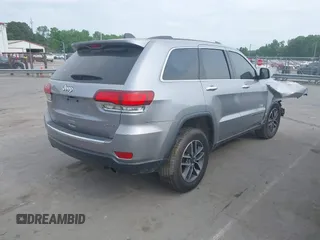 2021 Jeep Grand Cherokee Limited z VIN 1C4RJFBG2MC612156, wystawiony jako IAAI lot #42068461 z przebiegiem 99 675 mil mil oraz . Historia ofert i sprzedaży dostępna na DreamBid. Obrazek 4.