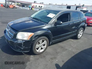 2010 Dodge Caliber SXT with VIN 1B3CB4HAXAD651644, listed as a IAAI auction lot 42173361 with 195,480 mi miles and . Bid and sale history available at DreamBid. Image 2.