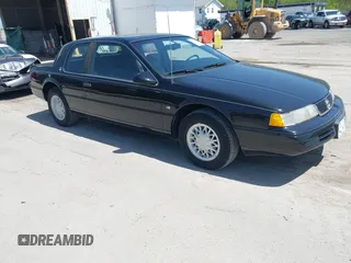 1993 Mercury Cougar z VIN 1MEPM62T2PH648852, wystawiony jako IAAI lot #42153041 z przebiegiem 77 658 mil mil oraz . Historia ofert i sprzedaży dostępna na DreamBid. Obrazek 1.