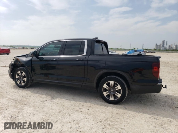 2019 Honda Ridgeline RTL-T with VIN 5FPYK2F63KB001322, listed as a Copart auction lot 51782335 with 112,608 mi miles and Clean title. Bid and sale history available at DreamBid. Image 2.
