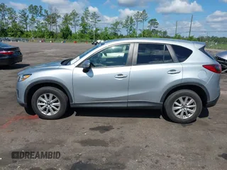 2016 Mazda CX-5 Touring z VIN JM3KE4CY4G0646114, wystawiony jako IAAI lot #42269181 z przebiegiem 58 252 mil mil oraz . Historia ofert i sprzedaży dostępna na DreamBid. Obrazek 15.
