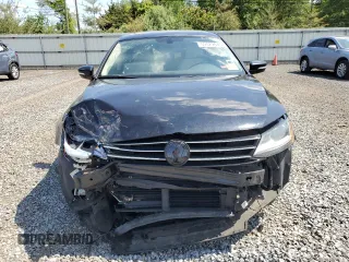 2017 Volkswagen Jetta SEL z VIN 3VWL17AJ6HM404789, wystawiony jako Copart lot #59029645 z przebiegiem 129 788 mil mil oraz Szkoda całkowita • Salvage title. Historia ofert i sprzedaży dostępna na DreamBid. Obrazek 5.