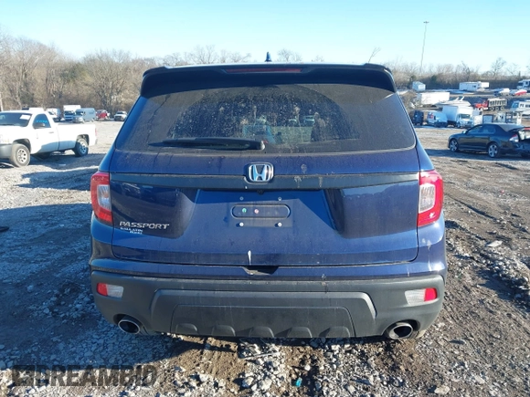 2019 Honda Passport EX-L with VIN 5FNYF7H50KB012132, listed as a IAAI auction lot 41327682 with 56,653 mi miles and . Bid and sale history available at carsss.com. Image 16.