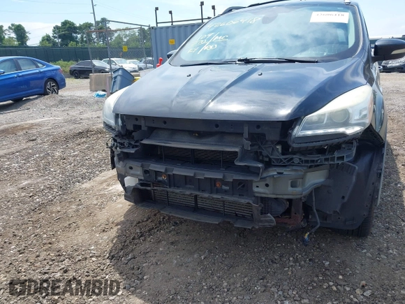 2013 Ford Escape Titanium z VIN 1FMCU9J93DUC06684, wystawiony jako IAAI lot #42606418 z przebiegiem 109 270 mil mil oraz . Historia ofert i sprzedaży dostępna na DreamBid. Obrazek 13.