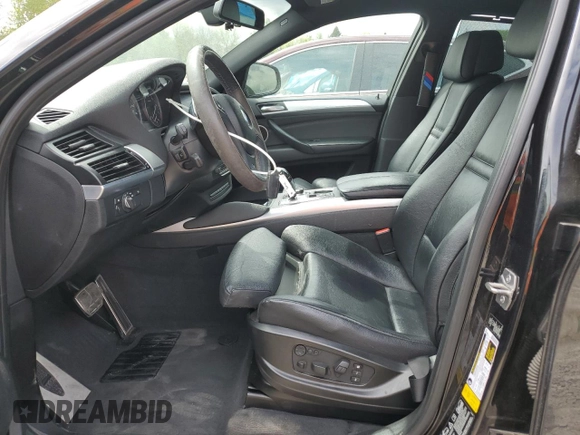 2013 BMW X6 xDrive50i z VIN 5UXFG8C5XDL591761, wystawiony jako Copart lot #54182645 z przebiegiem 117 250 mil mil oraz Szkoda całkowita • Salvage title. Historia ofert i sprzedaży dostępna na DreamBid. Obrazek 7.