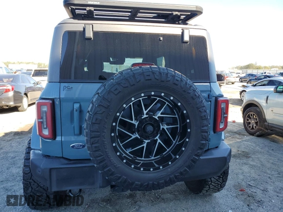 2021 Ford Bronco with VIN 1FMDE5CPXMLA63292, listed as a Copart auction lot 45659265 with 13,958 mi miles and Salvage title. Bid and sale history available at DreamBid. Image 6.