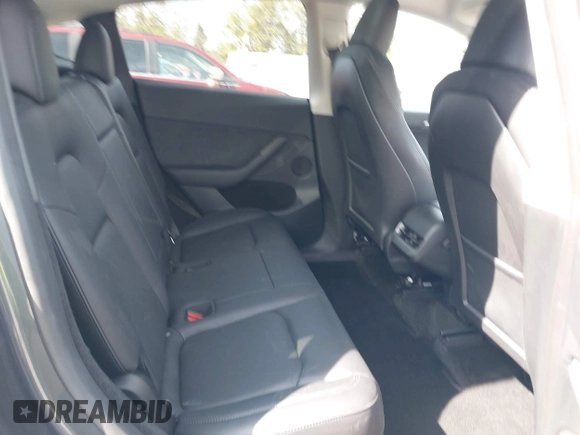 2023 Tesla Model Y Long Range with VIN 7SAYGDEE7PF856985, listed as a IAAI auction lot 42097675 with 13,112 mi miles and . Bid and sale history available at DreamBid. Image 8.