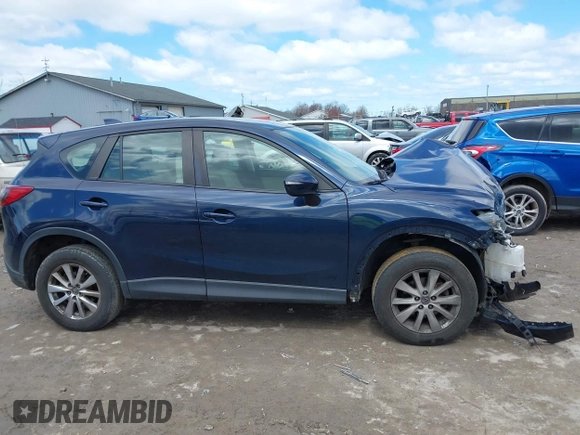 2015 Mazda CX-5 Sport with VIN JM3KE4BY3F0503011, listed as a IAAI auction lot 41973501 with 191,064 mi miles and . Bid and sale history available at carsss.com. Image 14.