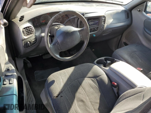 2000 Ford F-150 with VIN 1FTRX07W3YKA56561, listed as a Copart auction lot 81149654 with 185,967 mi miles and Salvage title. Bid and sale history available at DreamBid. Image 8.