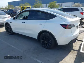 2022 Tesla Model Y Long Range with VIN 7SAYGDEE0NF340822, listed as a IAAI auction lot 41881224 with Not Provided miles and . Bid and sale history available at DreamBid. Image 3.