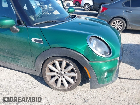 2020 MINI Hardtop 4 Door Cooper with VIN WMWXU7C06L2M63032, listed as a IAAI auction lot 42572567 with 86,220 mi miles and . Bid and sale history available at DreamBid. Image 6.