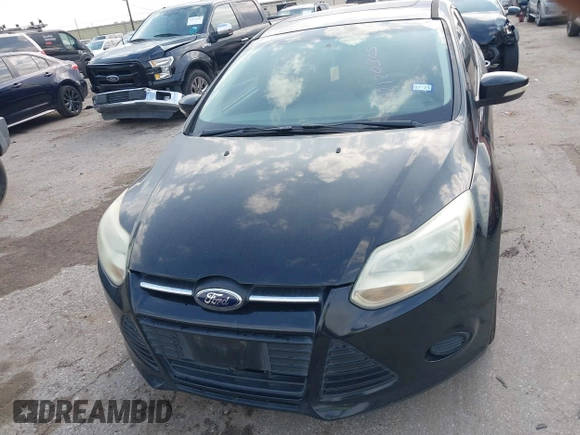 2014 Ford Focus SE with VIN 1FADP3F21EL157488, listed as a IAAI auction lot 42120325 with 198,658 mi miles and . Bid and sale history available at DreamBid. Image 6.
