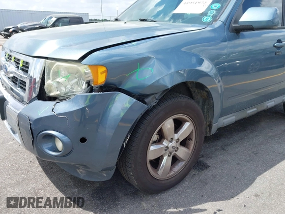 2011 Ford Escape Limited with VIN 1FMCU0E78BKB28559, listed as a IAAI auction lot 41951972 with 213,913 mi miles. Bid and sale history available at carsss.com. Image 6.