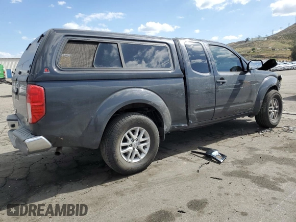 2015 Nissan Frontier SV with VIN 1N6BD0CTXFN708820, listed as a Copart auction lot 56605085 with 119,299 mi miles and Salvage title. Bid and sale history available at DreamBid. Image 3.
