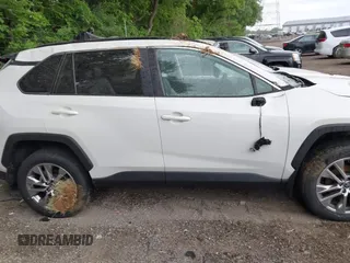 2022 Toyota RAV4 XLE Premium z VIN 2T3A1RFV1NW312419, wystawiony jako IAAI lot #42361686 z przebiegiem 14 291 mil mil oraz . Historia ofert i sprzedaży dostępna na DreamBid. Obrazek 13.