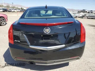 2013 Cadillac ATS z VIN 1G6AA5RAXD0155352, wystawiony jako Copart lot #52454965 z przebiegiem 105 571 mil mil oraz Szkoda całkowita • Salvage title. Historia ofert i sprzedaży dostępna na DreamBid. Obrazek 6.