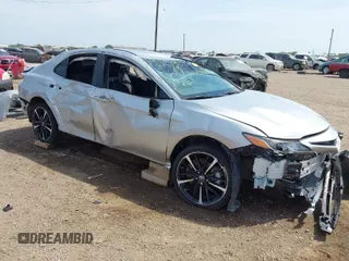 2018 Toyota Camry LE z VIN 4T1B11HK0JU509545, wystawiony jako IAAI lot #41879690 z przebiegiem 33 646 mil mil oraz . Historia ofert i sprzedaży dostępna na DreamBid. Obrazek 1.