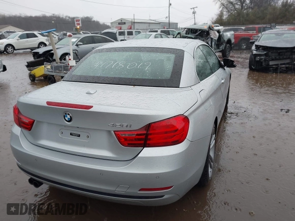 2014 BMW 4 Series 428i with VIN WBA3V5C51EJ968657, listed as a IAAI auction lot 41718019 with 111,083 mi miles and . Bid and sale history available at DreamBid. Image 4.