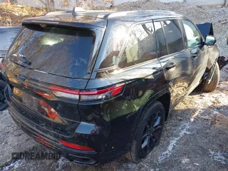 2024 Jeep Grand Cherokee with VIN 1C4RJYB69R8510818, listed as a IAAI auction lot 41574720 with 5,453 mi miles and . Bid and sale history available at DreamBid. Image 4.
