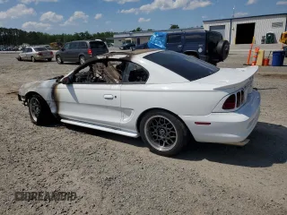1996 Ford Mustang Cobra с VIN 1FALP47V4TF118643, выставлен на аукционе Copart как лот 57999885 с пробегом Не указан миль и Списание • Salvage title. История ставок и продаж доступна на DreamBid. Изображение 2.