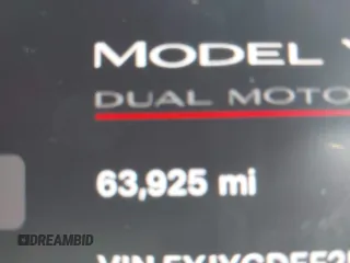 2021 Tesla Model Y Performance z VIN 5YJYGDEF2MF215938, wystawiony jako IAAI lot #41338287 z przebiegiem 63 925 mil mil oraz . Historia ofert i sprzedaży dostępna na DreamBid. Obrazek 14.