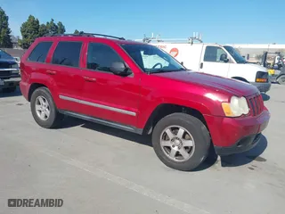 2010 Jeep Grand Cherokee Laredo with VIN 1J4PS4GK4AC121454, listed as a IAAI auction lot 41759966 with 69,390 mi miles. Bid and sale history available at carsss.com. Image 1.