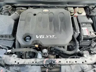2017 Chevrolet Impala Premier z VIN 1G1145S37HU167160, wystawiony jako Copart lot #69737465 z przebiegiem 88 335 mil mil oraz Szkoda całkowita • Salvage title. Historia ofert i sprzedaży dostępna na DreamBid. Obrazek 14.