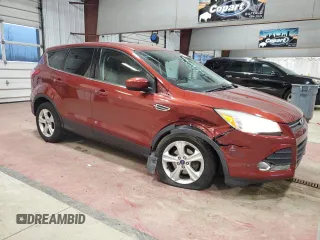 2015 Ford Escape SE with VIN 1FMCU0GX8FUB26785, listed as a Copart auction lot 50948425 with 73,177 mi miles and Salvage Title. Bid and sale history available at DreamBid. Image 4.