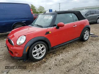 2012 MINI Convertible z VIN WMWZN3C58CT134224, wystawiony jako Copart lot #57610015 z przebiegiem 141 394 mil mil oraz Szkoda całkowita • Salvage title. Historia ofert i sprzedaży dostępna na DreamBid. Obrazek 1.