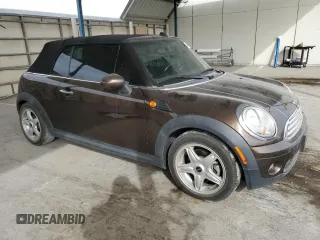 2010 MINI Convertible with VIN WMWMR3C50ATU97547, listed as a Copart auction lot 44780185 with 91,194 mi miles and Salvage Title. Bid and sale history available at DreamBid. Image 4.