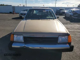 1986 Ford Escort z VIN 1FABP3495GW365298, wystawiony jako Copart lot #72817134 z przebiegiem 65 177 mil mil oraz Tytuł czysty. Historia ofert i sprzedaży dostępna na DreamBid. Obrazek 5.