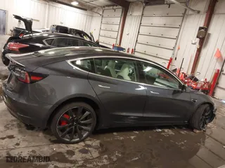 2020 Tesla Model 3 Performance with VIN 5YJ3E1EC3LF641768, listed as a IAAI auction lot 41542615 with 43,343 mi miles. Bid and sale history available at carsss.com. Image 14.