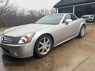 2005 Cadillac XLR z VIN 1G6YV34A255604073, wystawiony jako Copart lot #86889874 z przebiegiem 39 624 mil mil oraz Tytuł czysty. Historia ofert i sprzedaży dostępna na DreamBid. Obrazek 2.