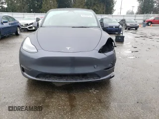 2022 Tesla Model Y Performance with VIN 7SAYGDEF2NF459268, listed as a Copart auction lot 45764735 with 64,421 mi miles and Salvage title. Bid and sale history available at DreamBid. Image 5.