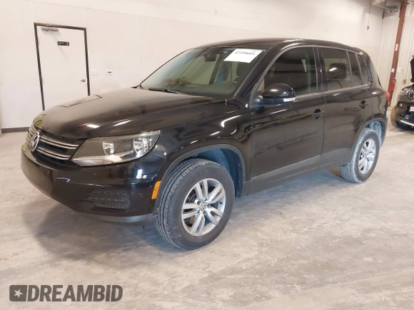 2014 Volkswagen Tiguan SE z VIN WVGAV3AX9EW614094, wystawiony jako IAAI lot #42350601 z przebiegiem 128 996 mil mil oraz . Historia ofert i sprzedaży dostępna na DreamBid. Obrazek 19.