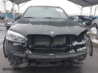 2018 BMW X5 xDrive40e iPerformance with VIN 5UXKT0C54J0V99573, listed as a IAAI auction lot 41490567 with 50,650 mi miles. Bid and sale history available at carsss.com. Image 13.
