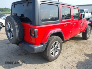 2020 Jeep Wrangler Unlimited Sahara with VIN 1C4HJXEN0LW184564, listed as a IAAI auction lot 42439173 with 79,426 mi miles and . Bid and sale history available at DreamBid. Image 4.