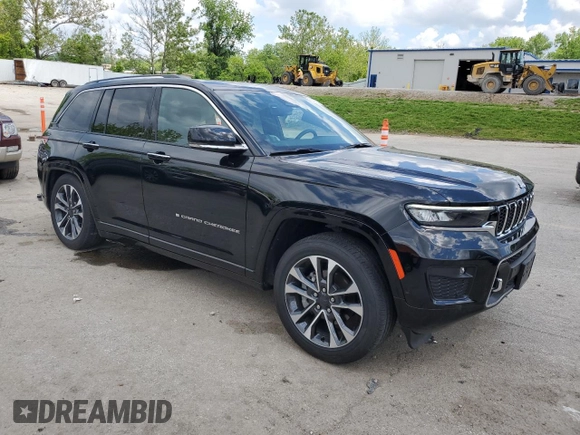 2023 Jeep Grand Cherokee Overland with VIN 1C4RJHDG0PC670537, listed as a Copart auction lot 56757285 with 24,735 mi miles and Salvage title. Bid and sale history available at DreamBid. Image 4.