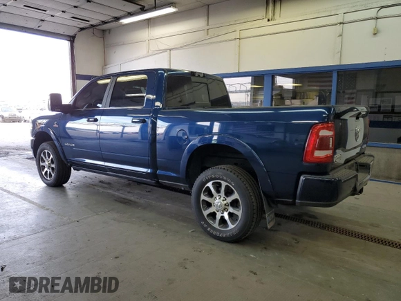 2023 Ram 2500 Longhorn with VIN 3C6UR5GL4PG646451, listed as a Copart auction lot 77141314 with 9,852 mi miles and Salvage Title. Bid and sale history available at carsss.com. Image 2.