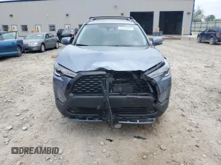 2024 Toyota Corolla Cross LE with VIN 7MUCAABGXRV118308, listed as a Copart auction lot 59959645 with 11,972 mi miles and Non repairable. Bid and sale history available at DreamBid. Image 5.