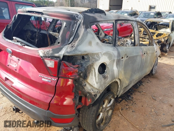 2019 Ford Escape Titanium z VIN 1FMCU9J99KUA72809, wystawiony jako IAAI lot #41588522 z przebiegiem Nie podano mil oraz . Historia ofert i sprzedaży dostępna na DreamBid. Obrazek 4.