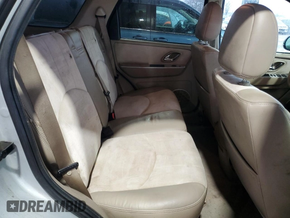 2005 Mercury Mariner Luxury z VIN 4M2YU561X5DJ04364, wystawiony jako Copart lot #44622345 z przebiegiem 265 744 mil mil oraz Szkody całkowita. Historia ofert i sprzedaży dostępna na DreamBid. Obrazek 11.
