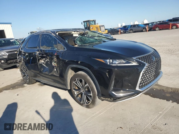2021 Lexus RX with VIN 2T2HZMAA0MC194477, listed as a Copart auction lot 48732585 with 0 mi miles and Salvage Title. Bid and sale history available at carsss.com. Image 4.