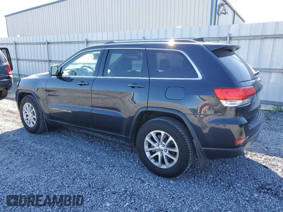 2014 Jeep Grand Cherokee Laredo with VIN 1C4RJEAG9EC260562, listed as a Copart auction lot 56496384 with 113,898 mi miles and Salvage Title. Bid and sale history available at carsss.com. Image 2.