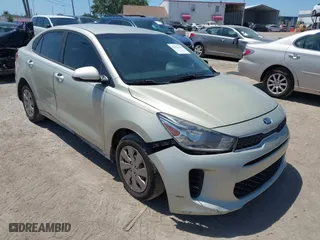 2018 Kia Rio LX with VIN 3KPA24AB2JE137858, listed as a IAAI auction lot 42016321 with 136,728 mi miles. Bid and sale history available at carsss.com. Image 1.