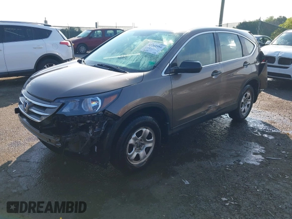 2013 Honda CR-V LX with VIN 3CZRM3H31DG703436, listed as a IAAI auction lot 42702584 with 140,013 mi miles and . Bid and sale history available at DreamBid. Image 18.